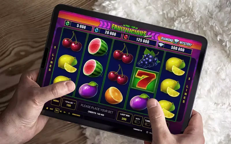 Stylish player at computer surrounded by bright neon casino icons and glowing digital effects, capturing the electric GOOD111 atmosphere in Bangladesh